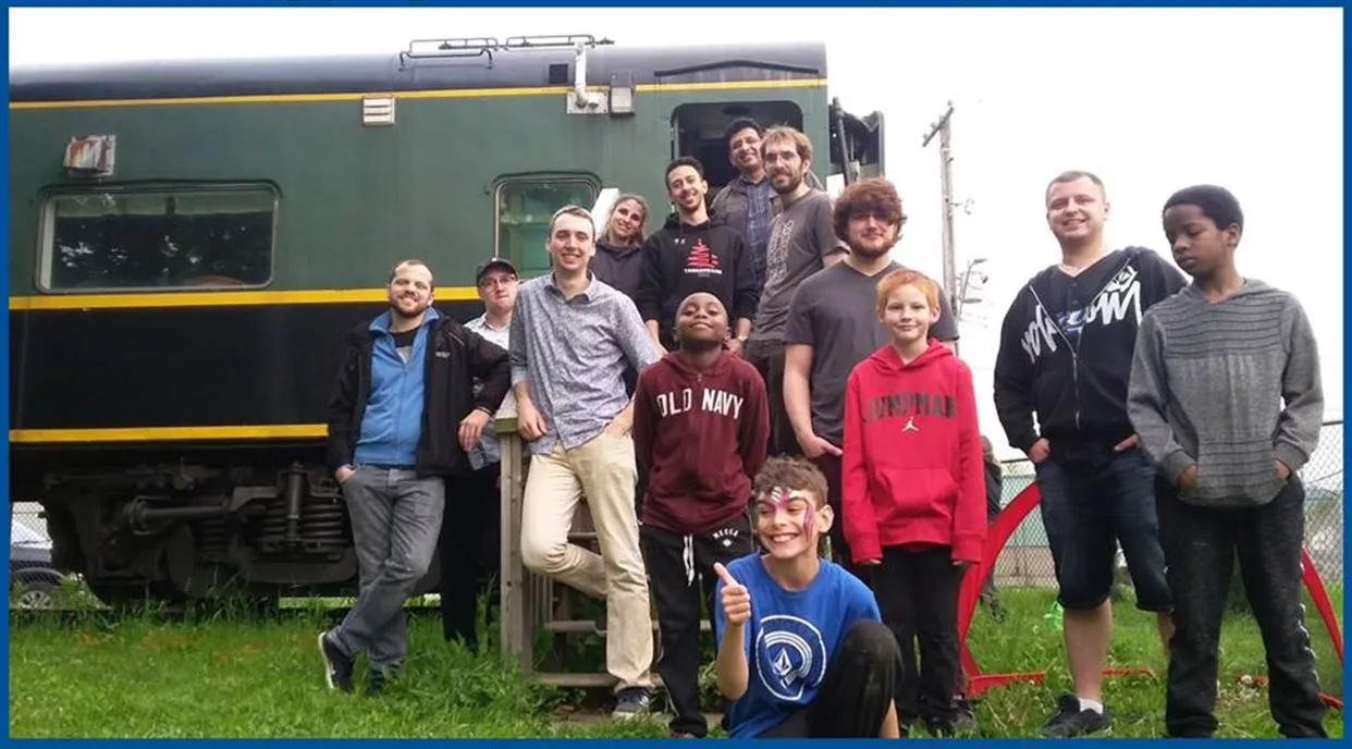 Try to get both the train and people in there if possible